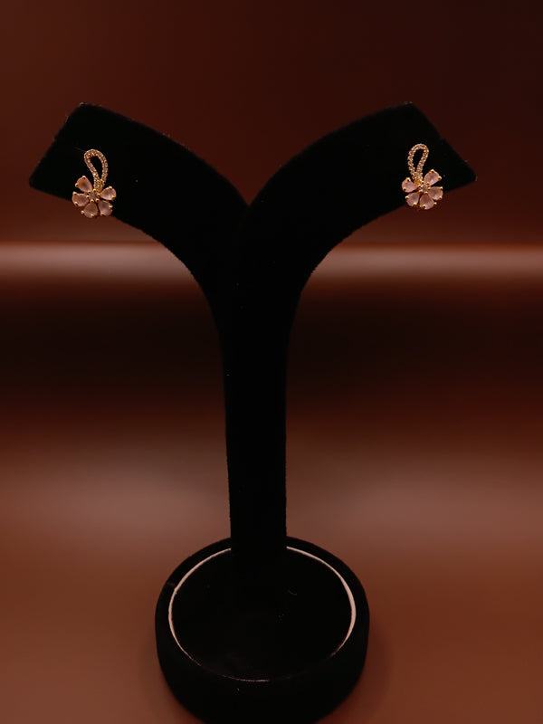 Floral stud earring with gold accents