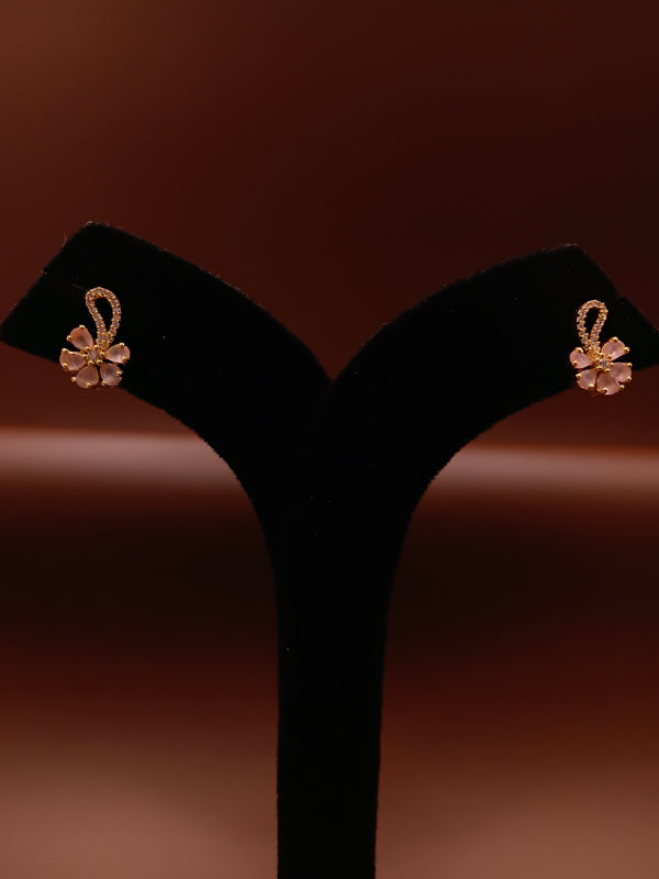 Floral stud earring with gold accents