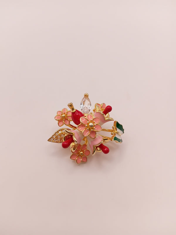 Floral designer brooch with gold-tone finish