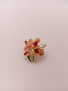 Floral designer brooch with gold-tone finish