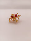 Floral designer brooch with gold-tone finish