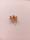 Floral designer brooch with gold-tone finish