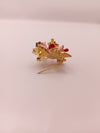 Floral designer brooch with gold-tone finish