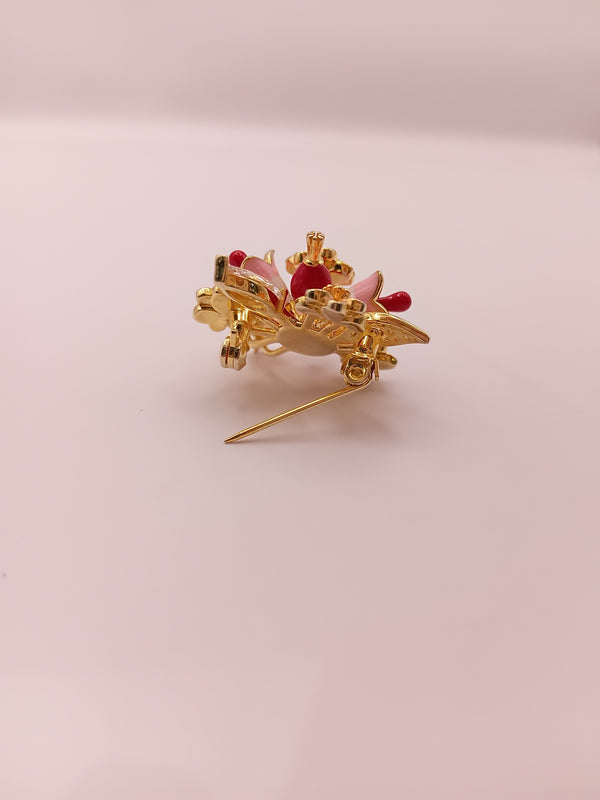 Floral designer brooch with gold-tone finish